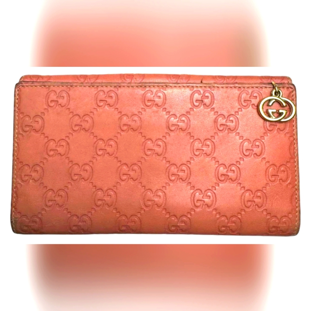 Gucci Coral Embossed GG Zip Wallet with Gold Charm Accent